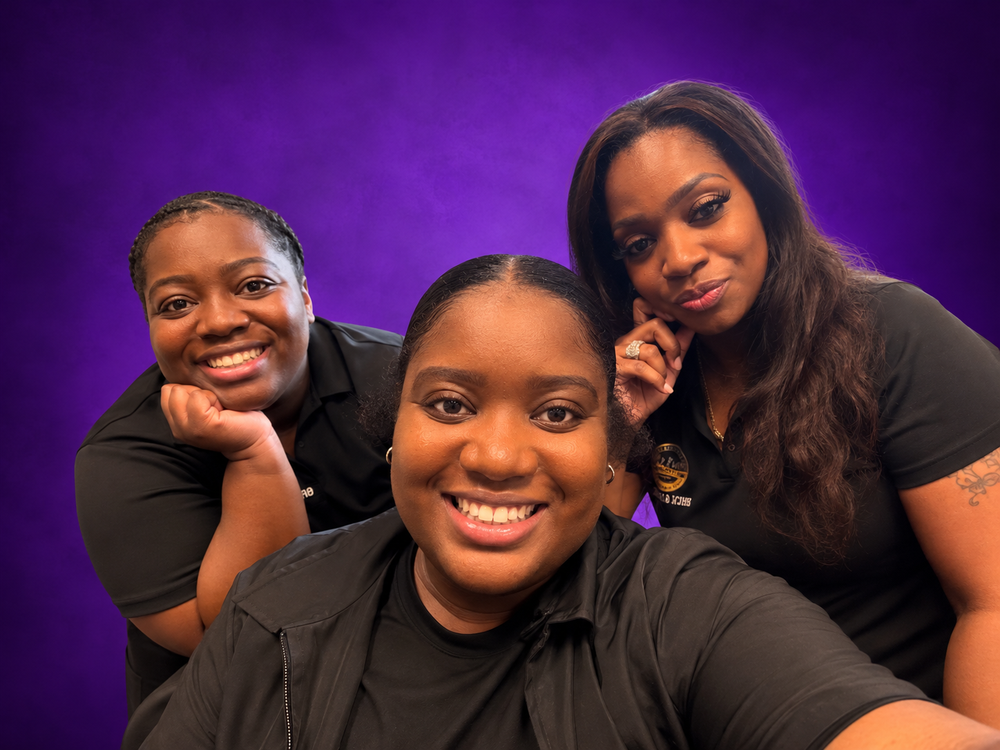 Lady A's Braids and Weaves Studio team featuring Lady A, Mrs. Kajha, and Ms. Kash